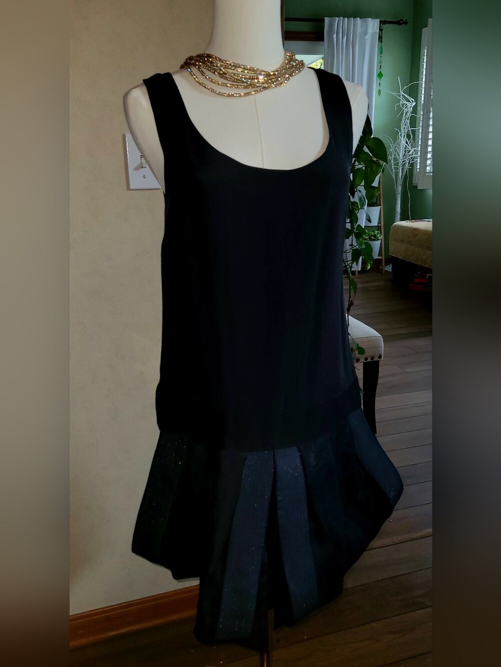 Erin Black Sleeveless Pleated Hem Dress